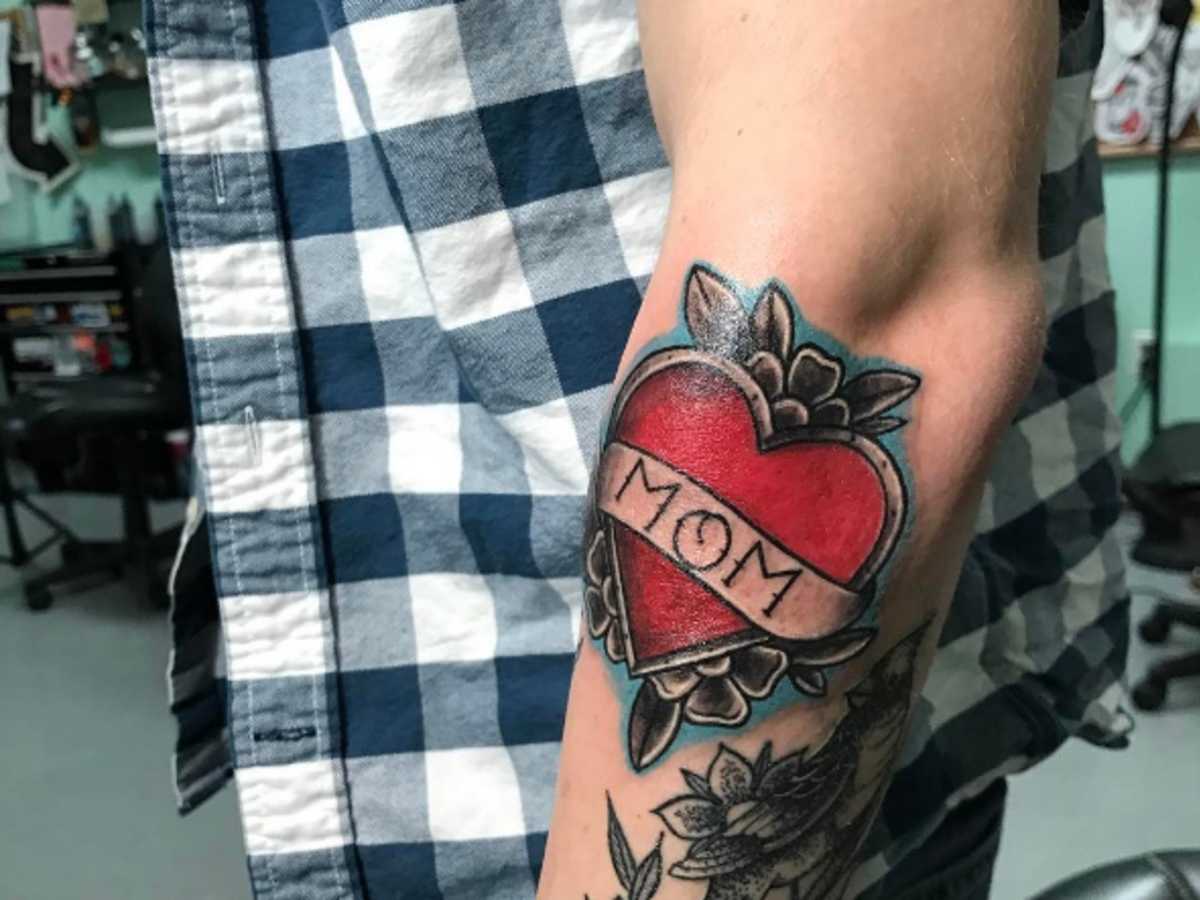 Show Your Love with a Braun Arm Tattoo: Here are Top Designs and Ideas