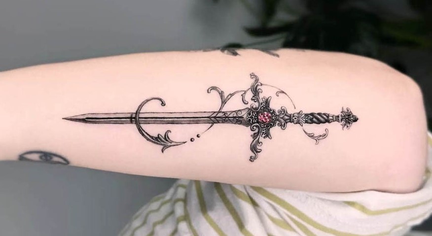 Meaning of a Sword Tattoo: Is It a Symbol of Power or Something More? (Find Out!)